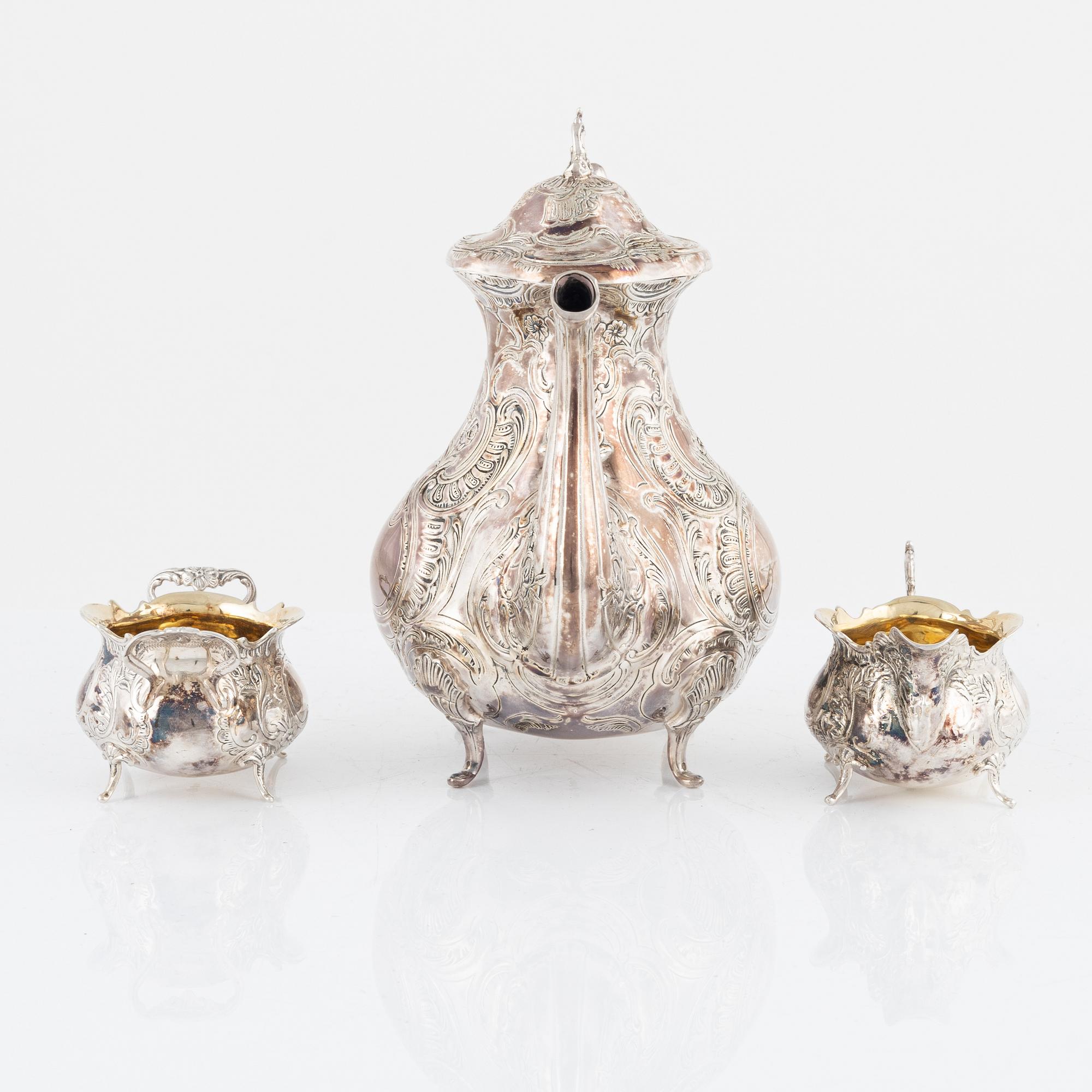 A Swedish Silver Coffee Pot, Creamer and Sugar Bowl, mark of Gewe Silvervarufabriken, Malmö 1971-73.