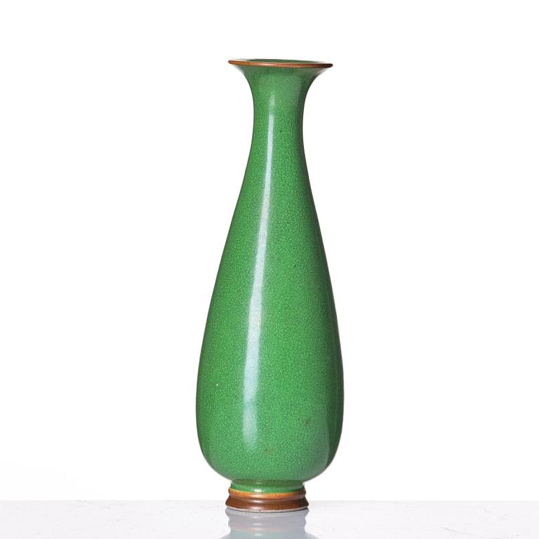 A Chinese apple-green-glazed vase, Qing dynasty.