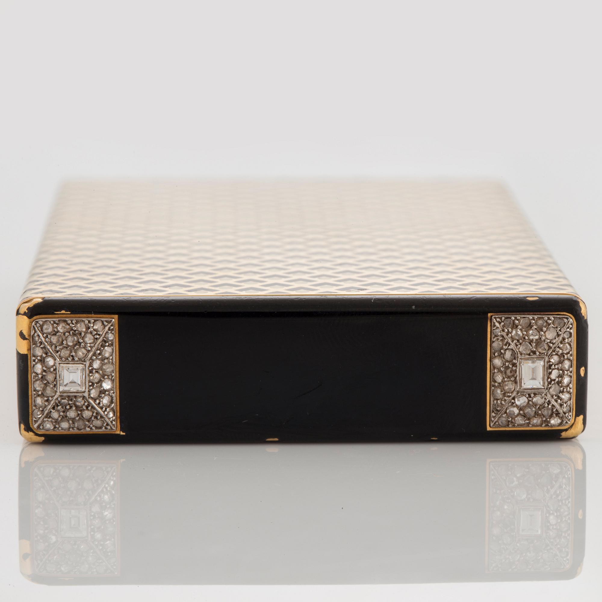 Cartier Art Deco Vanity Case 18K guld med svart emalj och baguette- och rosenslipade diamanter.