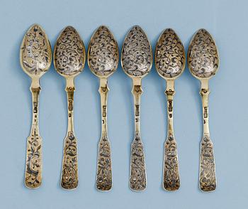 1200. A SET OF SIX RUSSIAN SILVER-GILT AND NIELLO TEA-SPOONS, un identified makers mark, Moscow 1846.