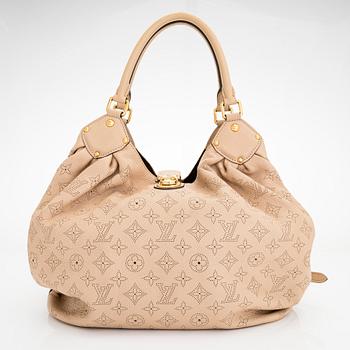 Louis Vuitton, a 'Mahina L' bag.