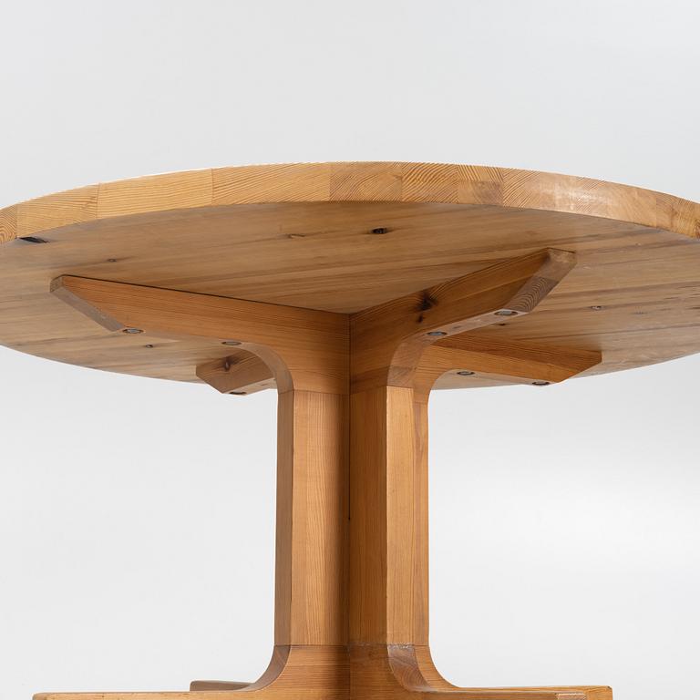 A 1970's pine dining table.