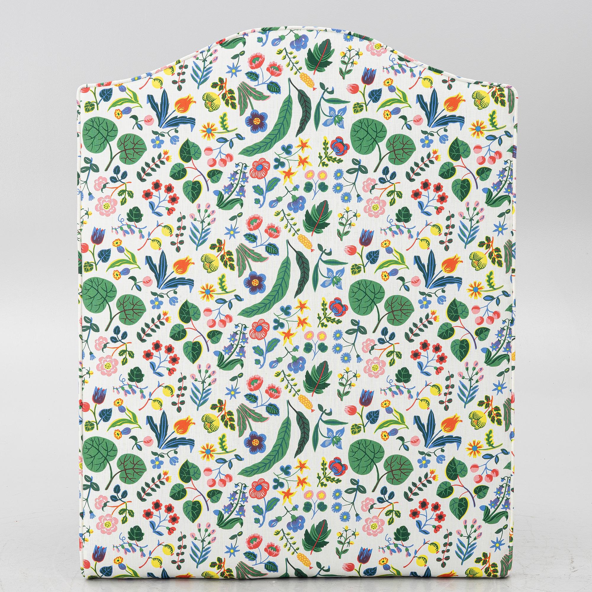 Headboard, upholstered in fabric from Svenskt Tenn.