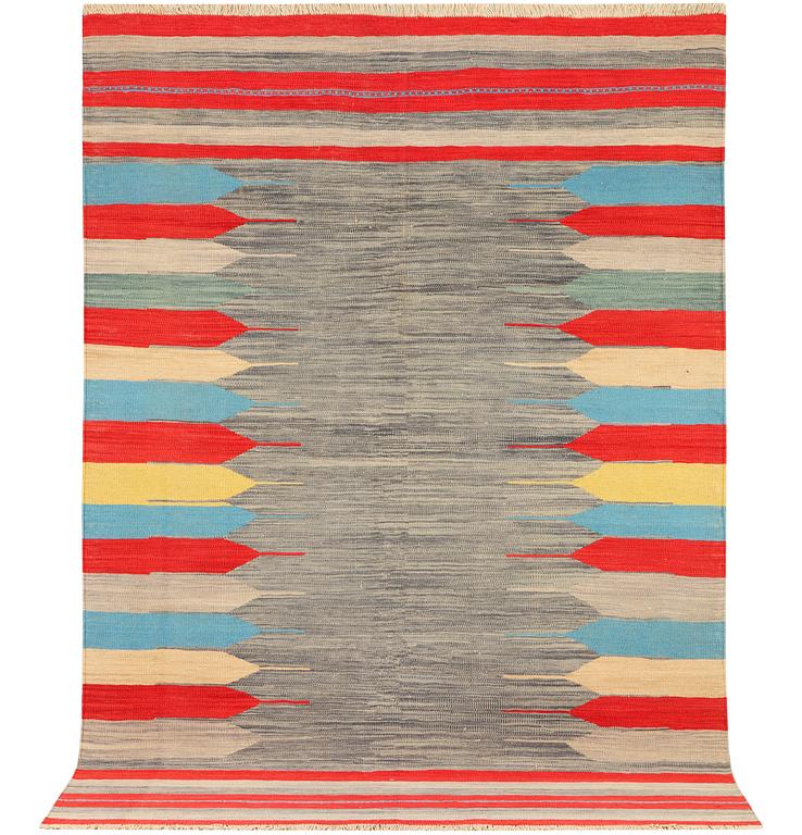 An Afghan Kilim carpet, c. 293 x 199 cm.
