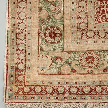 MATTO, an antique silk Tabriz, ca 165 x 118,5-111,5 cm.