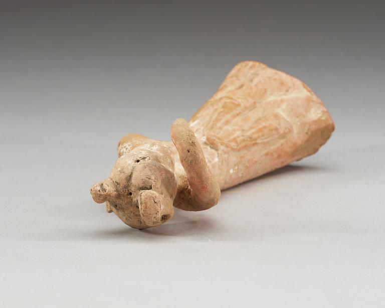 A potted figure of a dancer, Tang dynasty (618-907).