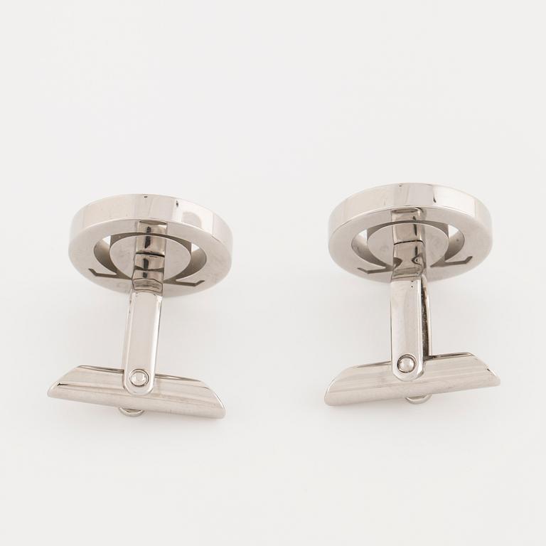 OMEGA, ett par manschettknappar.