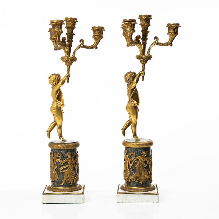 A pair of Empire style candelabra, circa 1900.