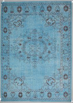 An oriental carpet, ca 365 x 264 cm.