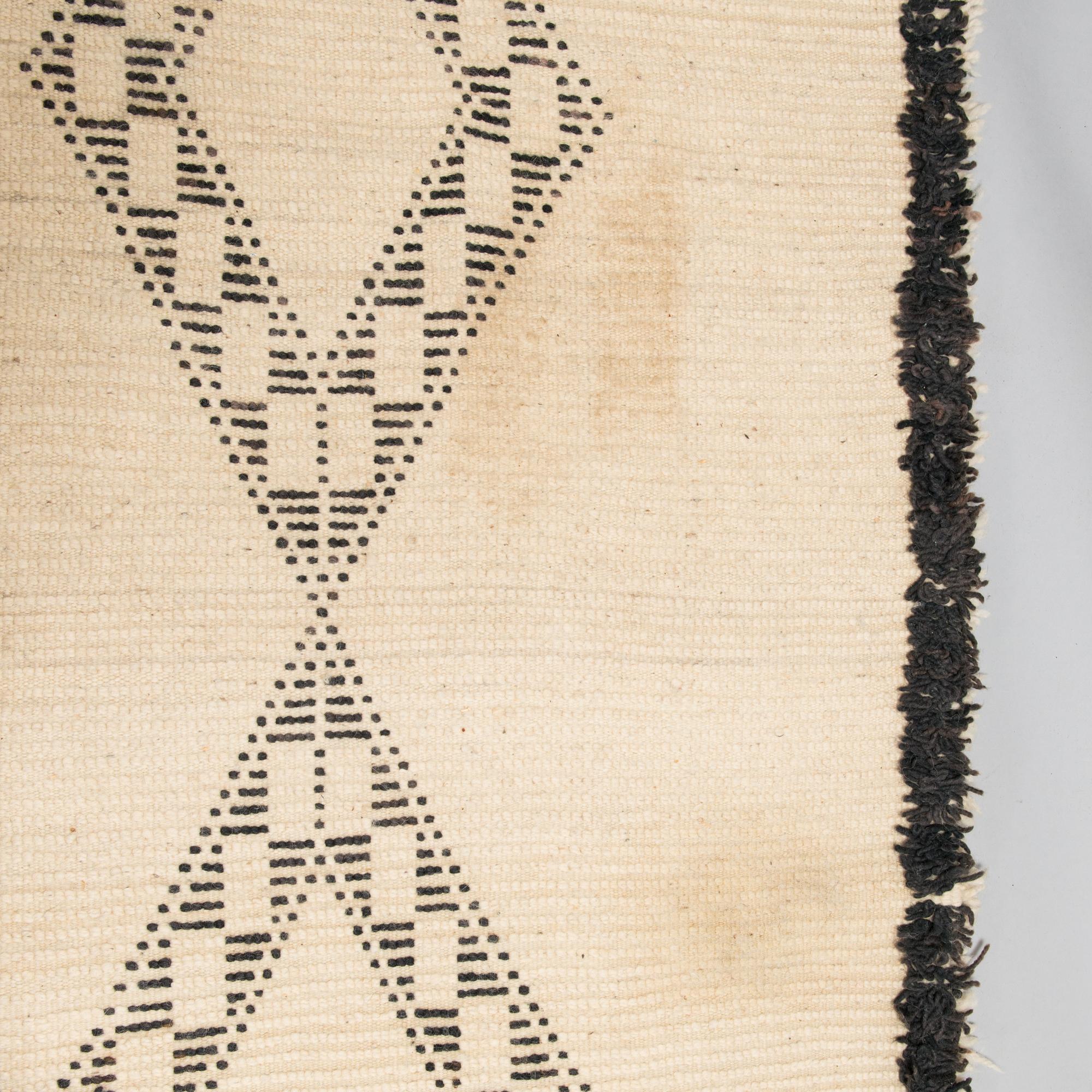 A Moroccan Beni Ourain carpet. circa 420x196 cm.
