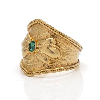 14K gold ring with an emerald.