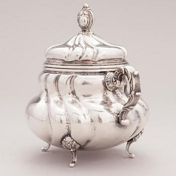 A lidded silver sugar bowl and a set of six silver bowls, Germany.