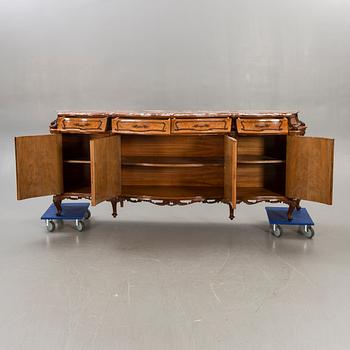 A Louis XV style birch sideboard first half of the 20th century.
