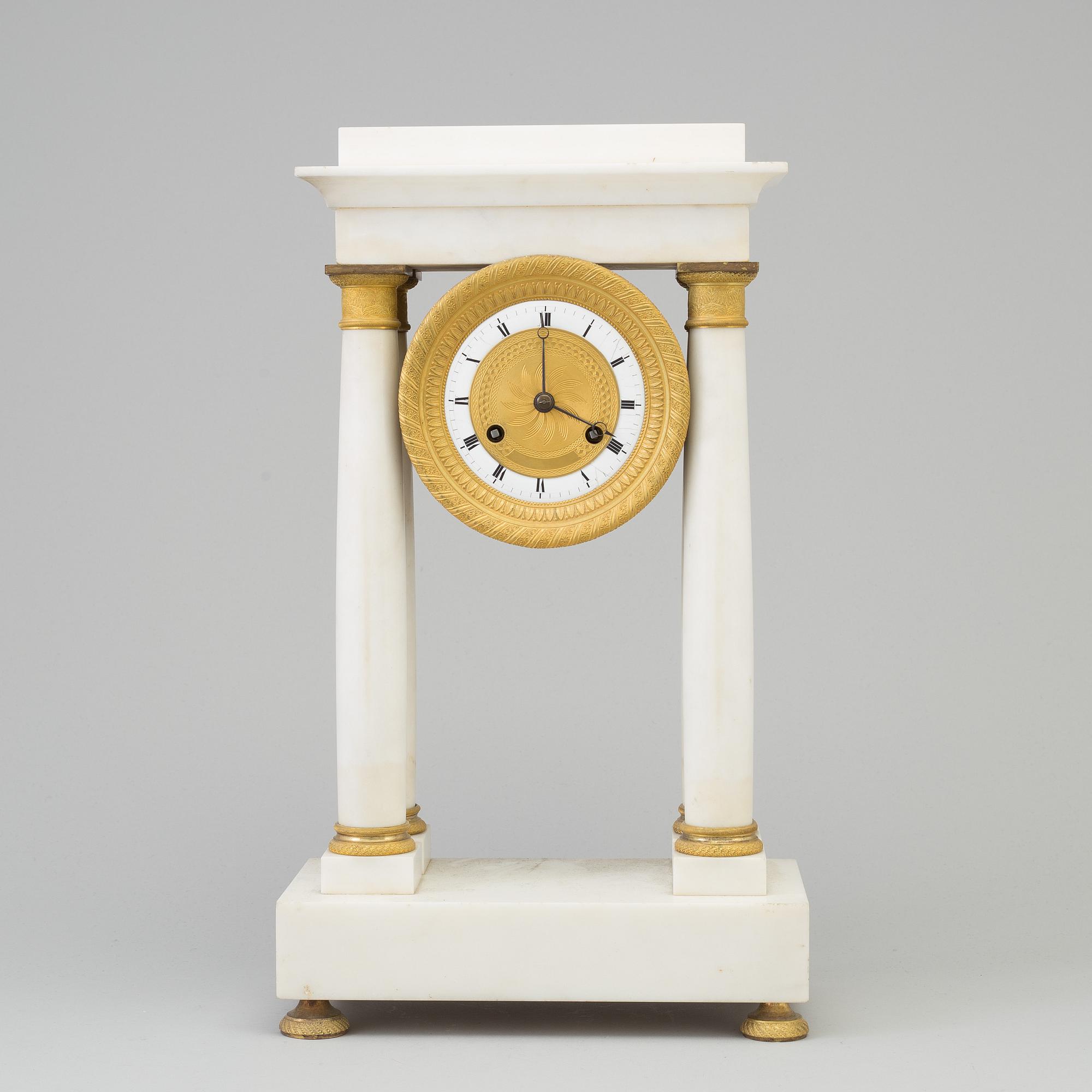 A french empire mantle clock, first half of the 19th century.