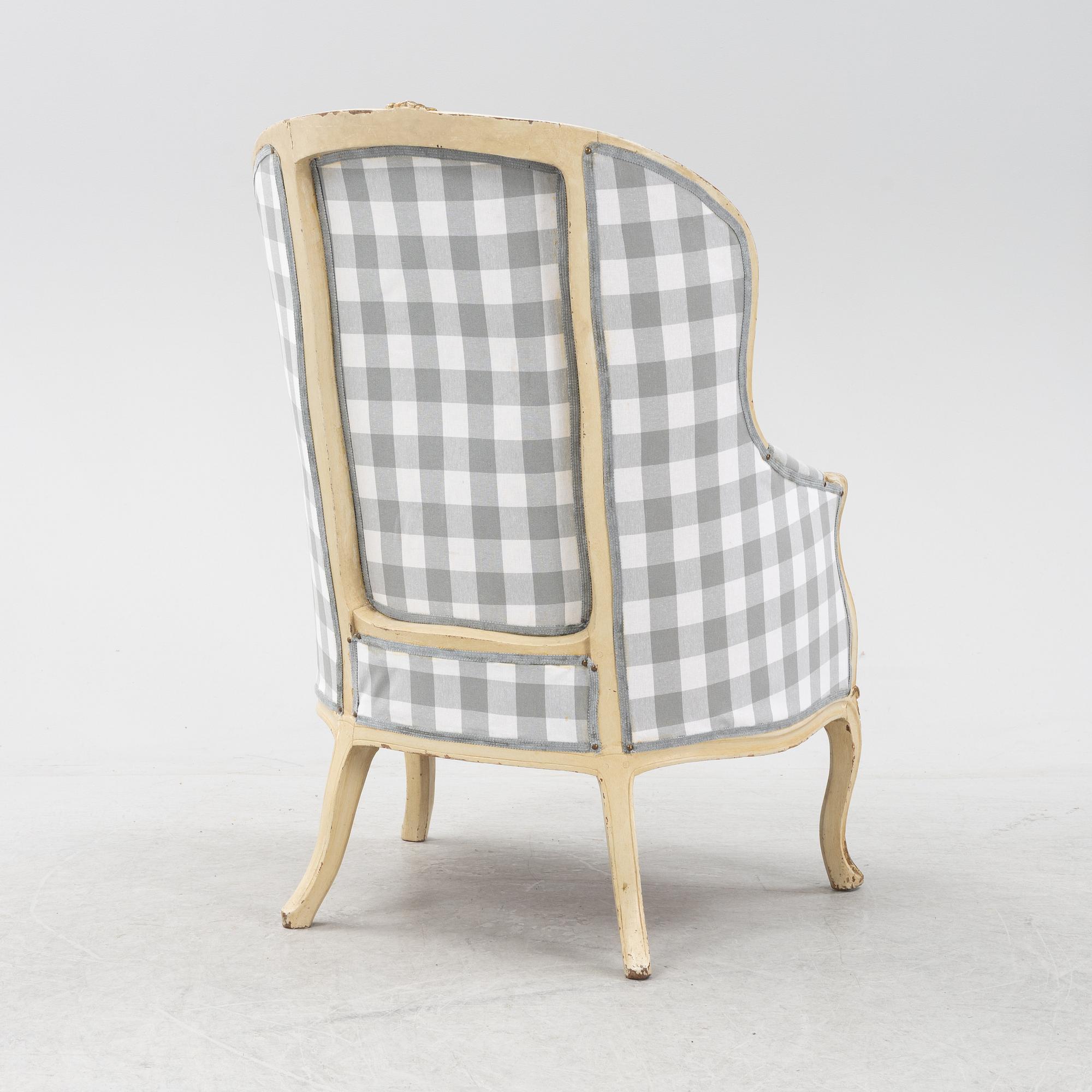 A Rococo-Style Bergère Easy Chair, first half of the 20th century.