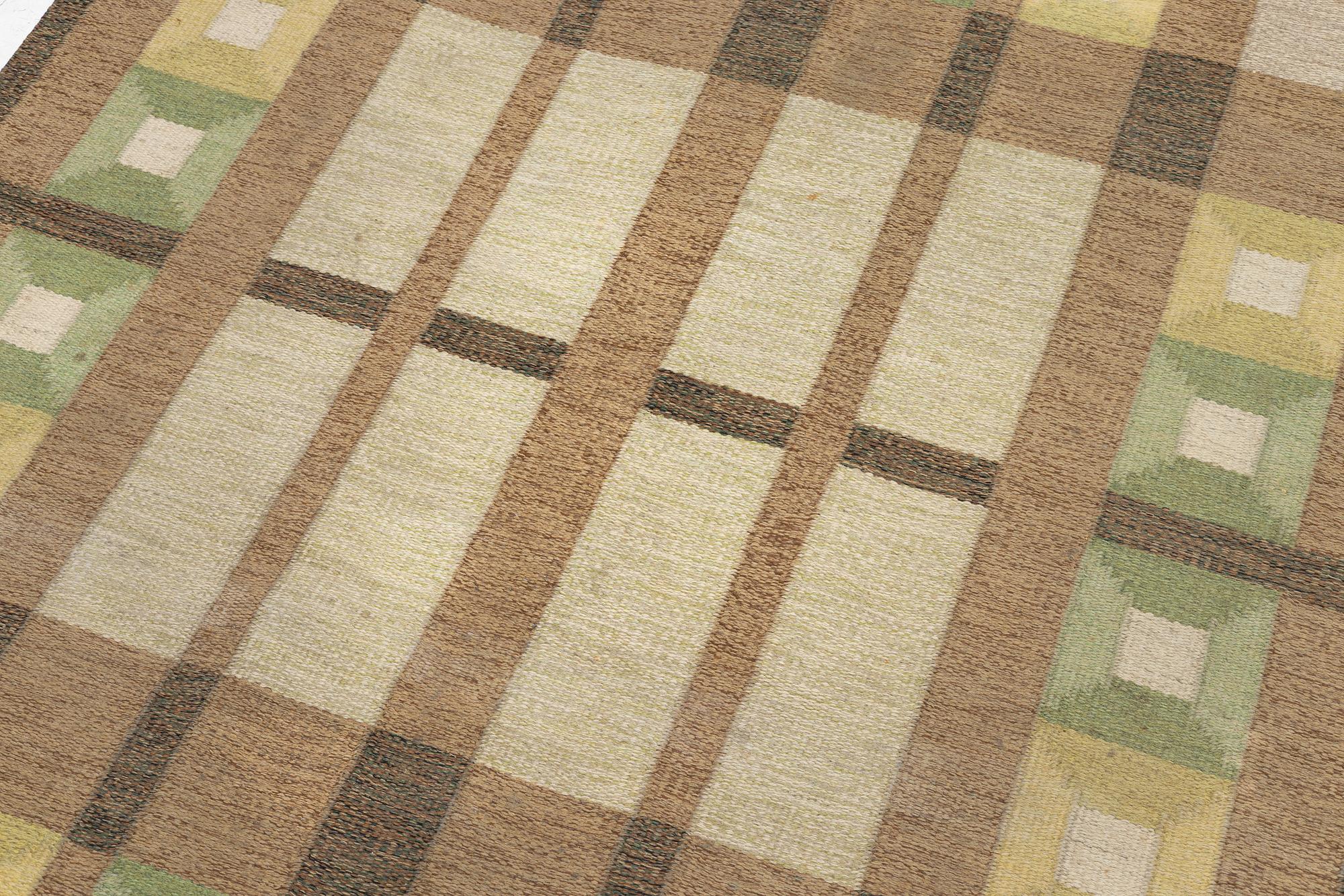 A flat weave carpet, signed, ca. 243 x 165 cm.