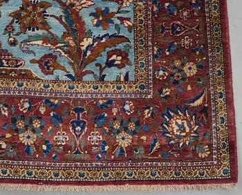 A RUG, a semi-antique silk Kashan, ca 201,5 x 122-130 cm.