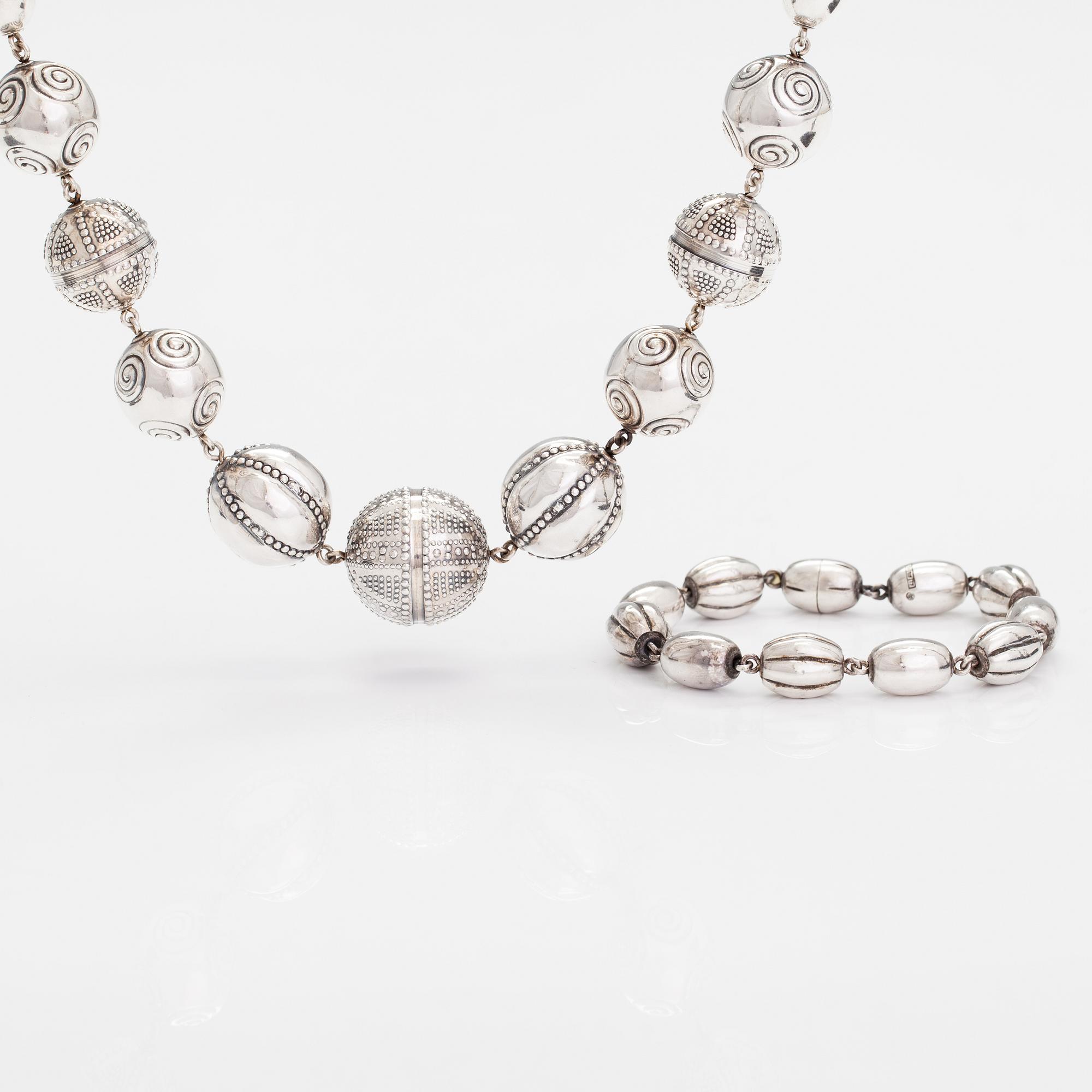 A set of sterling silver necklace and bracelet "Halikko treasure". Kalevala Koru, Helsinki 1967-72.