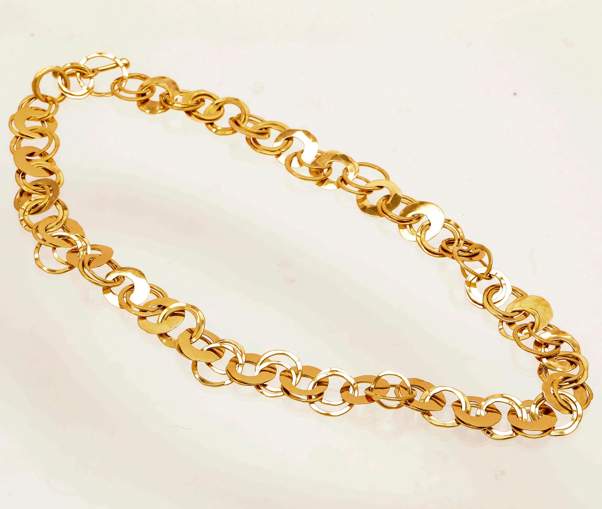 An 18K gold necklace by Cusi Italy.