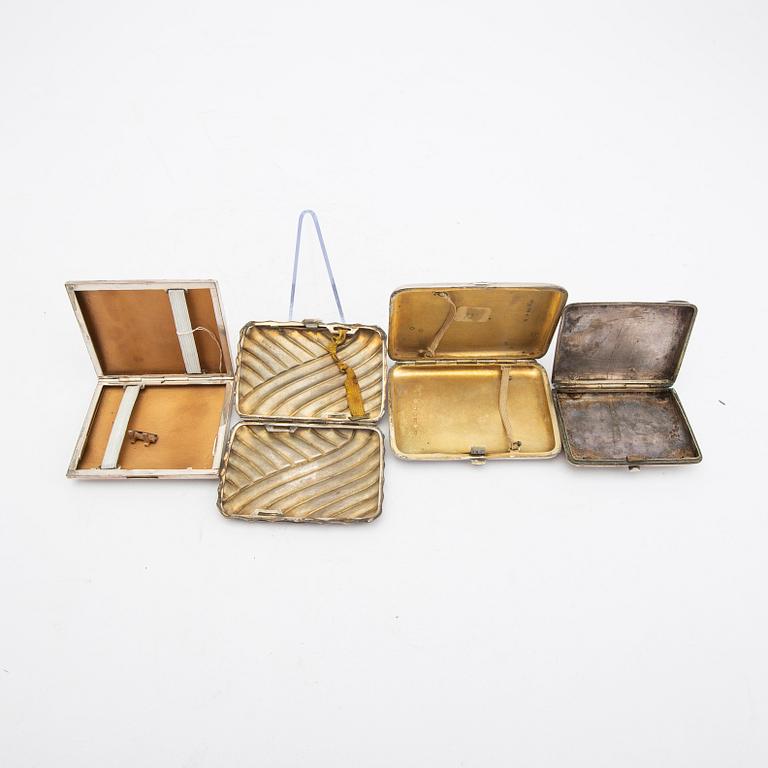 A set of four 19th/20th century silver cigarette cases, total weight 342 grams.