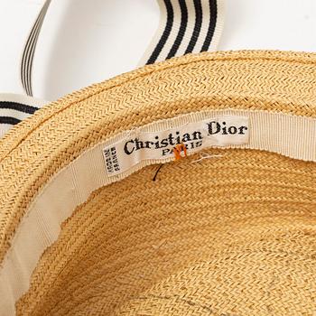 Christian Dior, a silk dress and straw hat, circa size S.