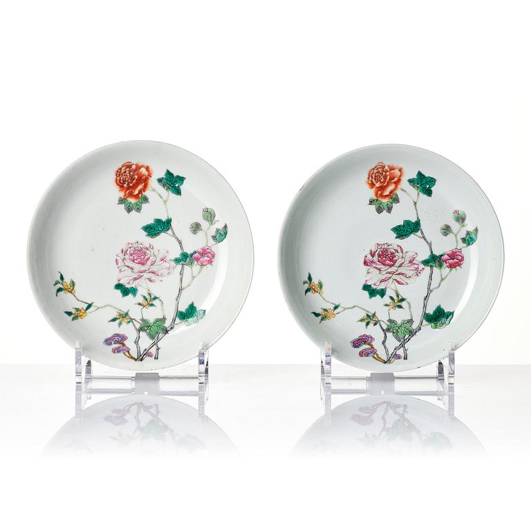A set of four famille rose floral dishes, Qing dynasty with a apocryphal six character mark.
