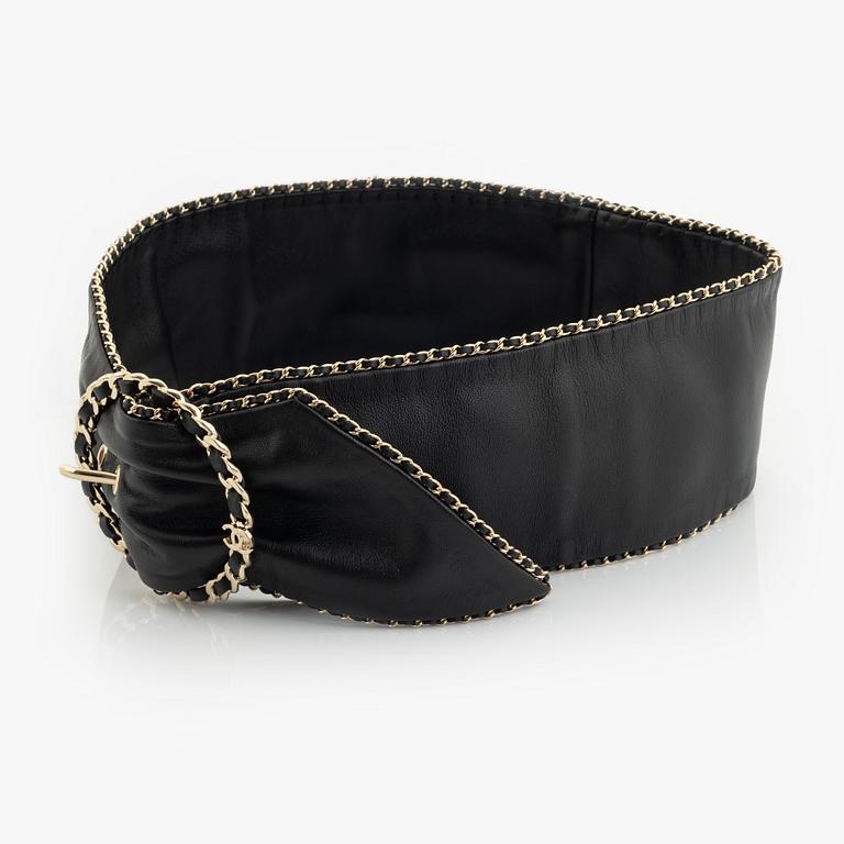 Chanel, a black leather belt.