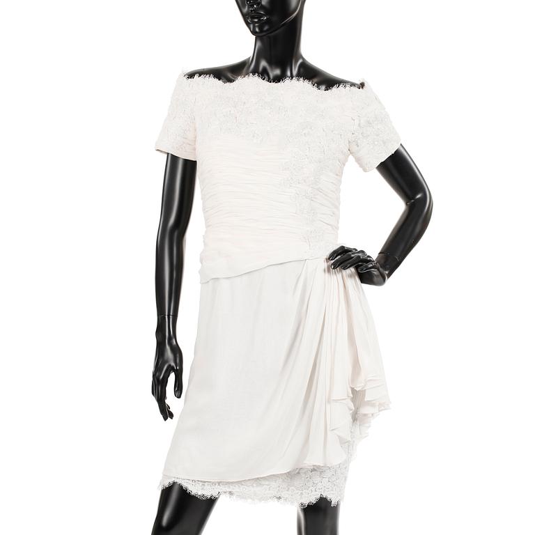 ODICINI COUTURE, a white silk cocktail dress.