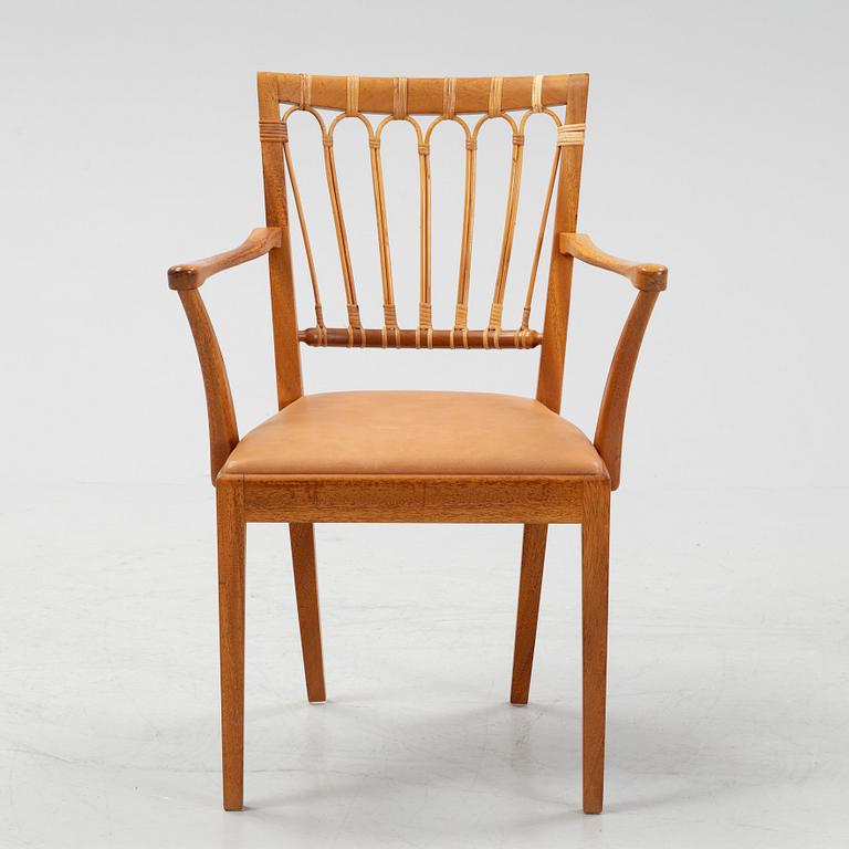 A model 1165 armchair by Josef Frank for Firma Svenskt Tenn.