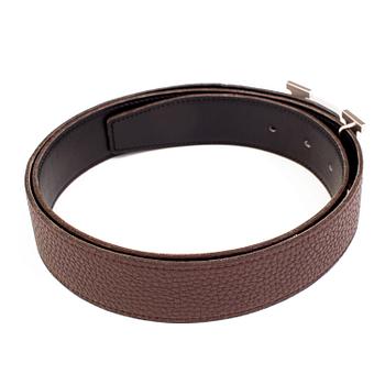 Brown togo belt "Constance" by Hermès.