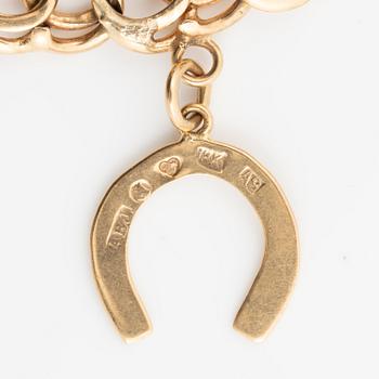 Armband 18K guld bismarcklänk, med berlocker.