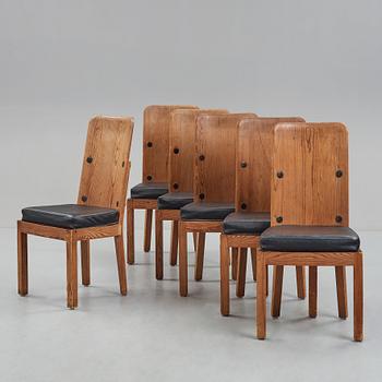 Axel Einar Hjorth, a set of six high back "Lovö" stained pine chairs, Nordiska Kompaniet, Sweden 1930's.