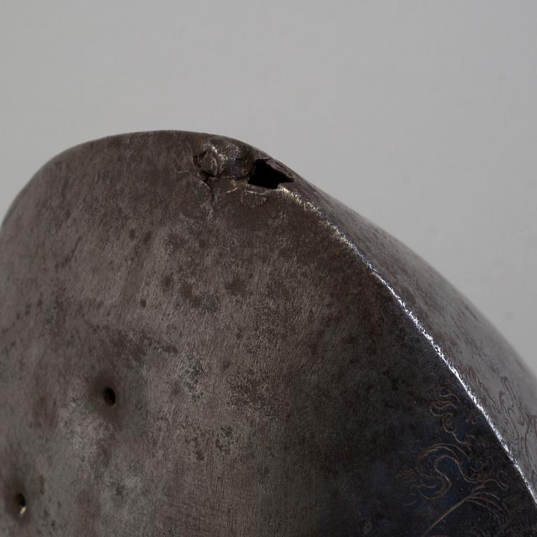 A 16th century cabasset helmet.