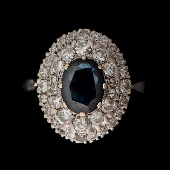 A RING, facetted sapphire, brilliant and 8/8 cut diamonds, 18K white gold. Meidän Sepät, Espoo Finland 1993.