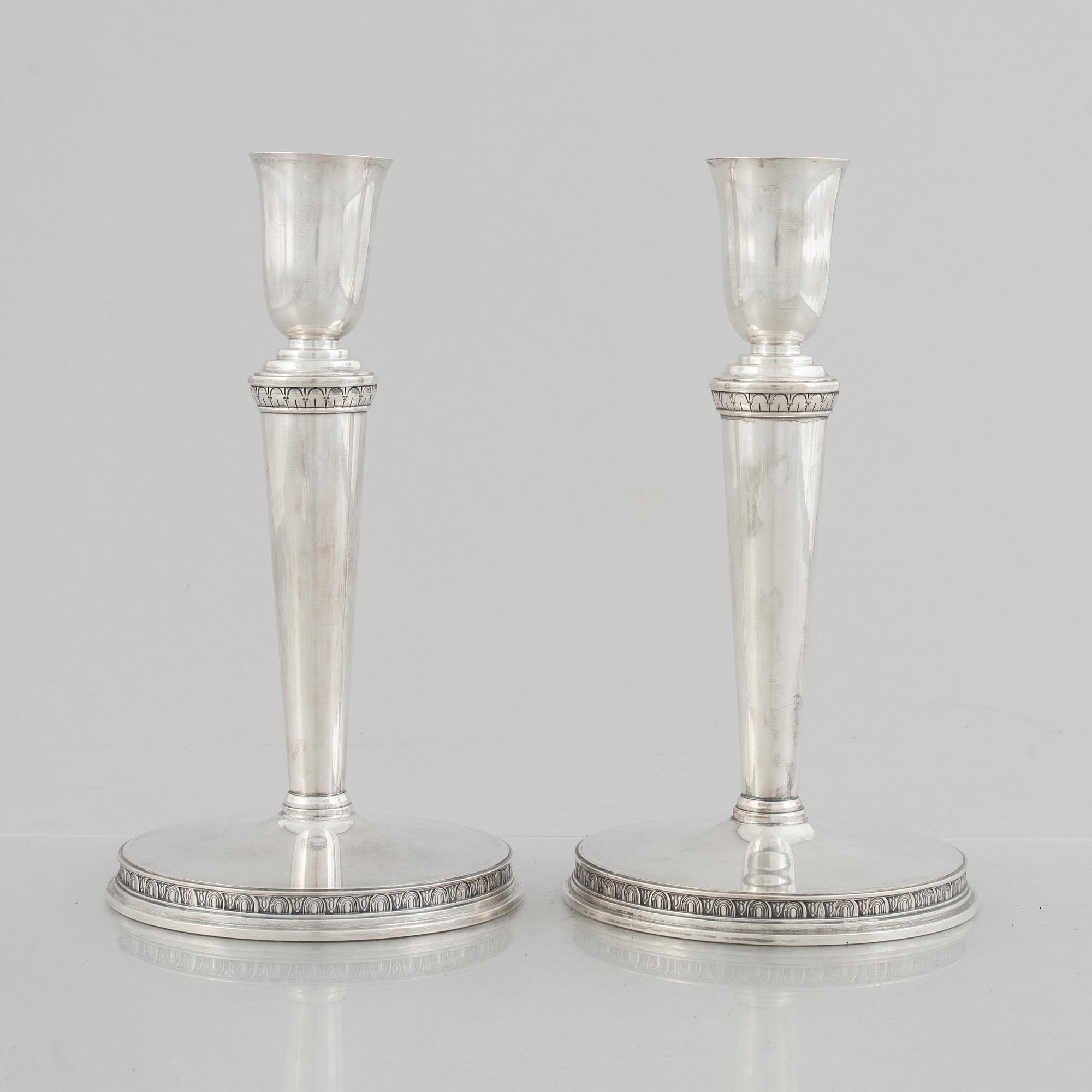 Eric Råström, a pair of silver candlesticks, Råströms Silver- O Nysilverfabrik , Stockholm 1957.