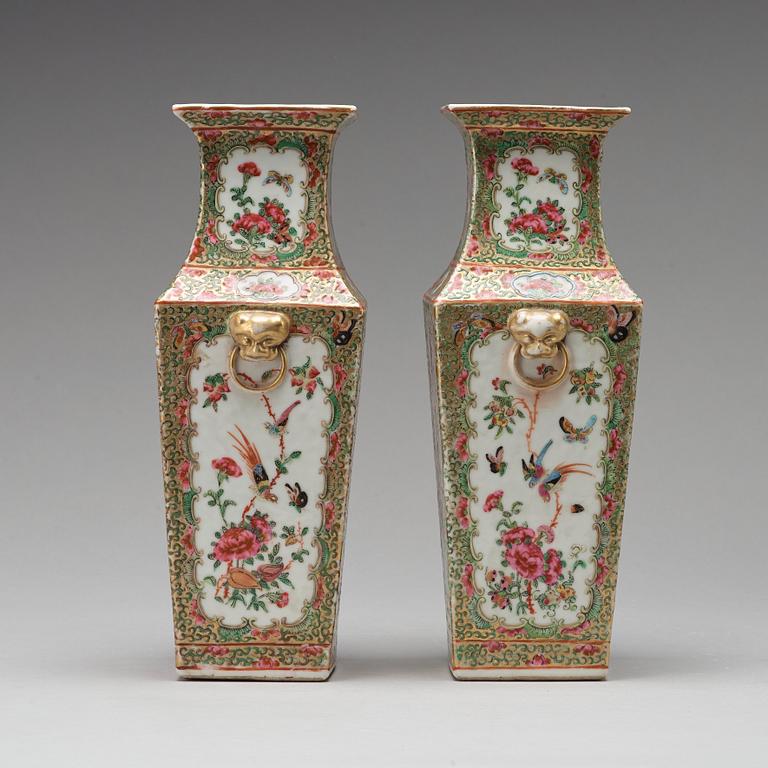 A pair of Canton famille rose vases, Qing dynasty, 19th Century.