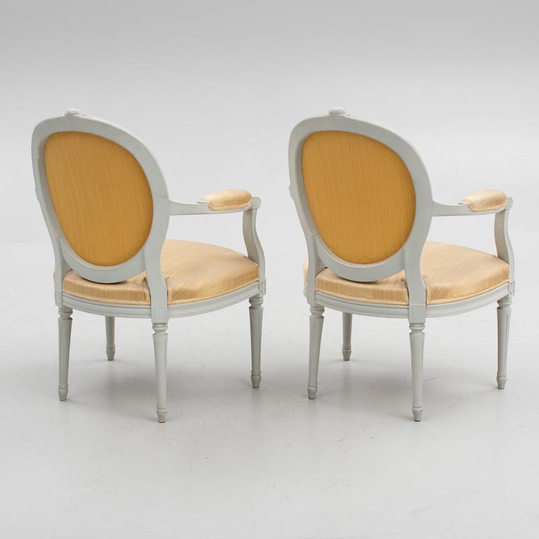 A pair of Gustavian style armchairs, 20th Century.