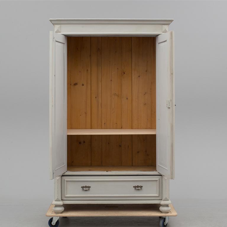 A wardrobe, circa 1900.