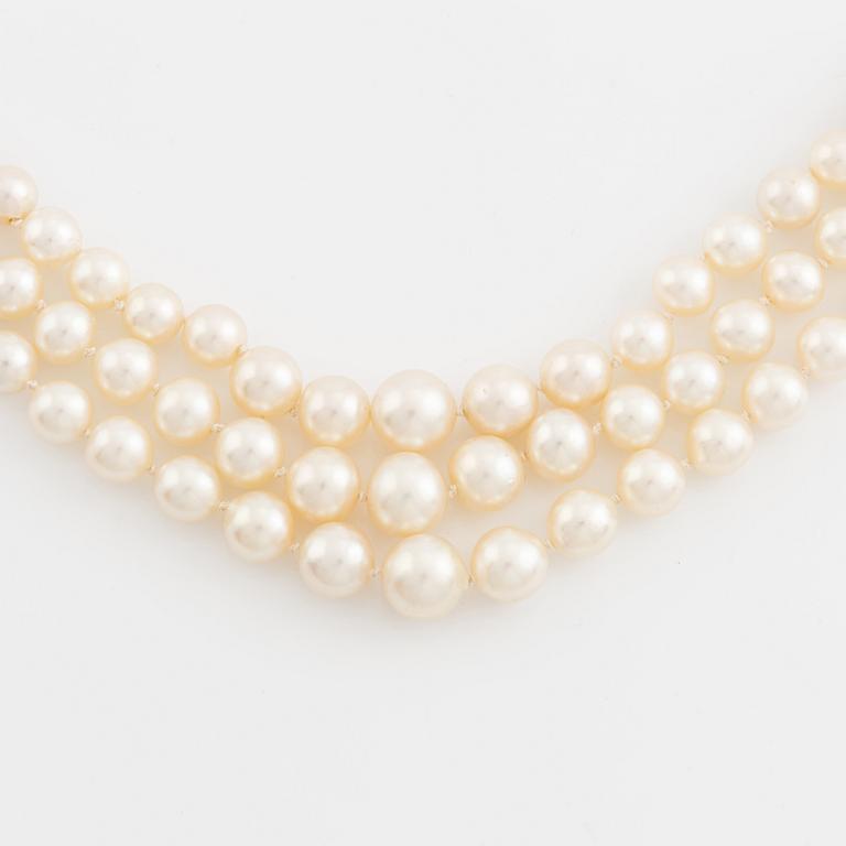 Three strand calibrated cultured pearl necklace, clasp with pearl and rose cut diamonds.