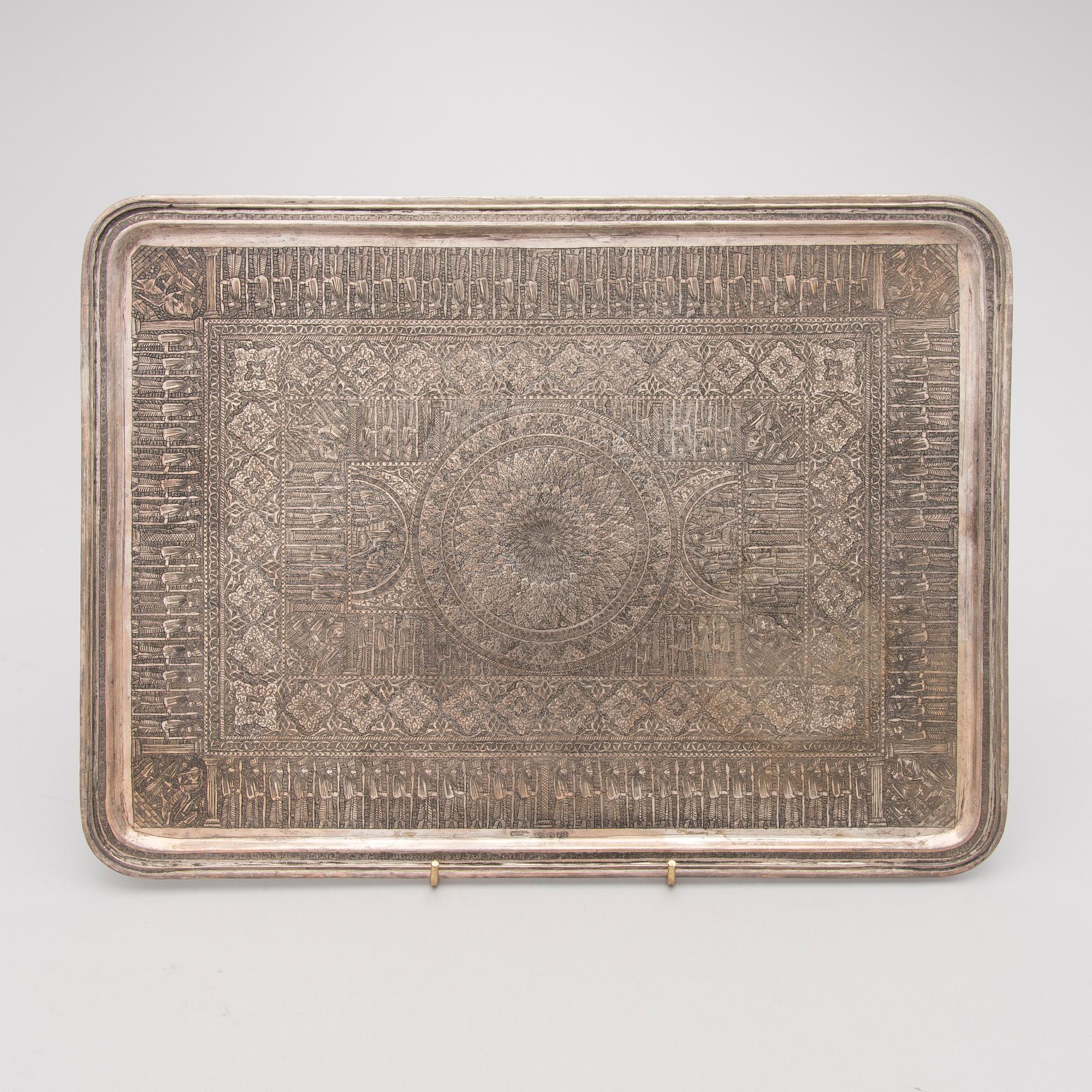 A Persian silver tray, mark of Vaspour, silver mark 84.