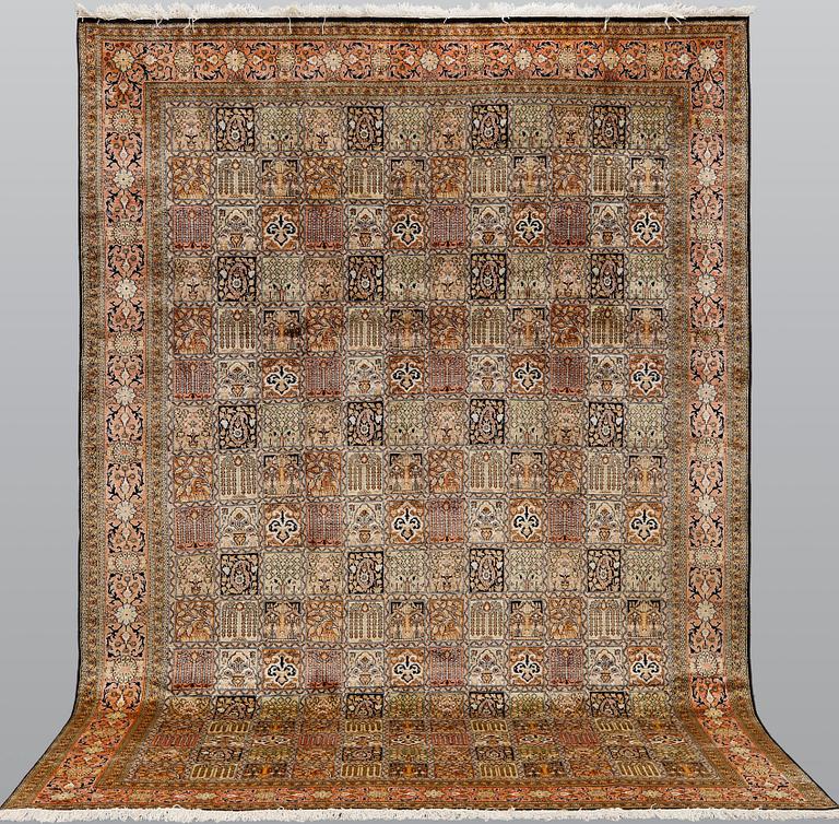 A silk Kashmir carpet, ca 313 x 212 cm.