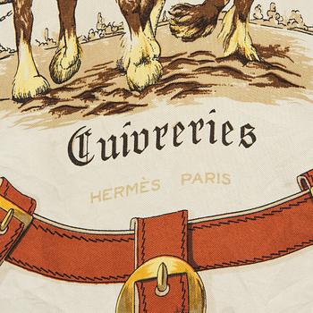 A silk scarf "Cuivreries" by Hermès.