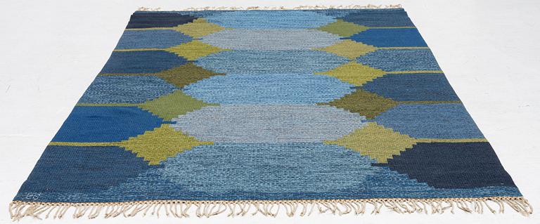 A flat weave carpet, c. 252 x 153 cm signed BS.