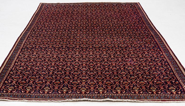 An oriental rug, c. 295 x 180 cm.