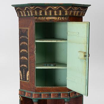 Corner cabinet, dated 1800.