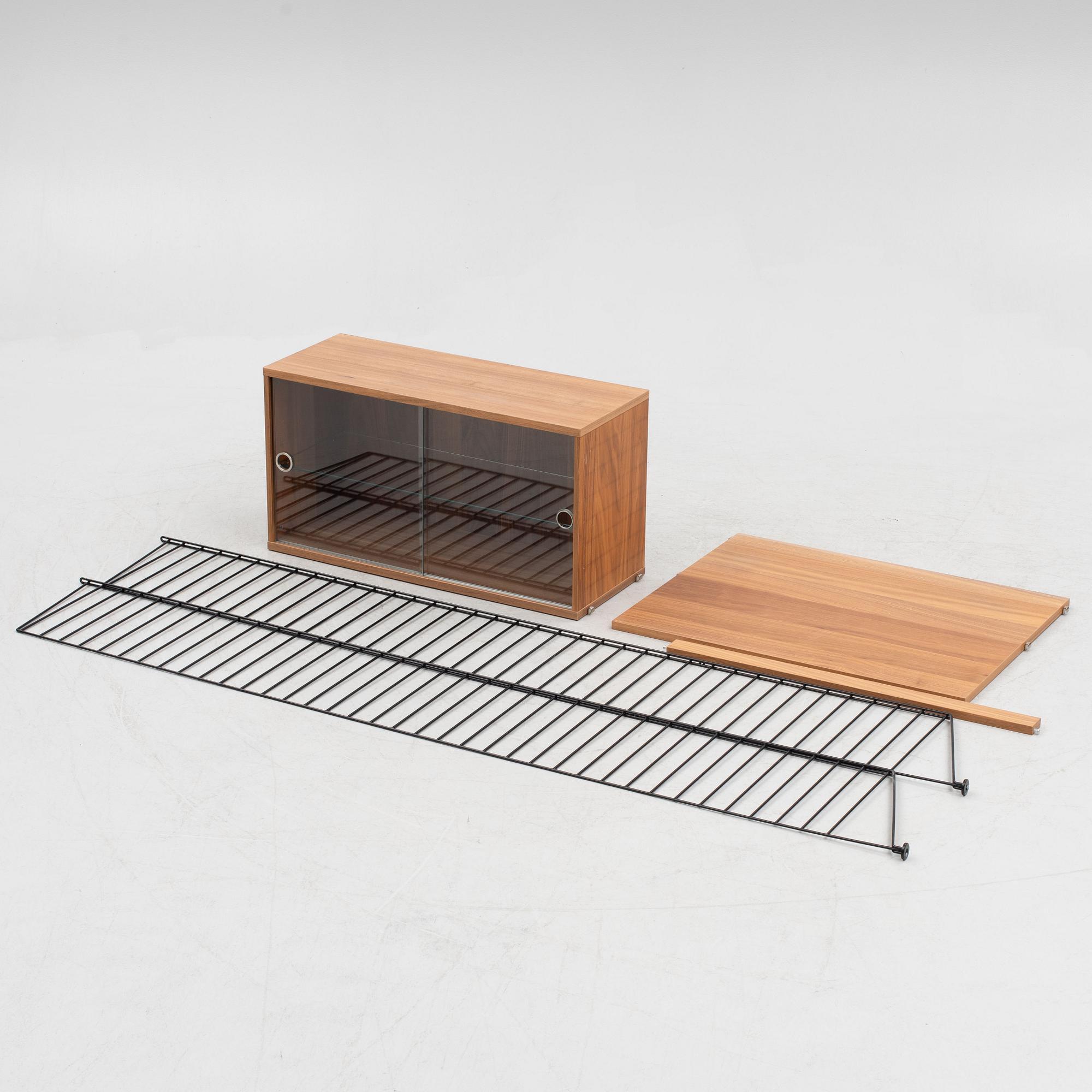 Nils Strinning, shelving system with desk, "String", contemporary.