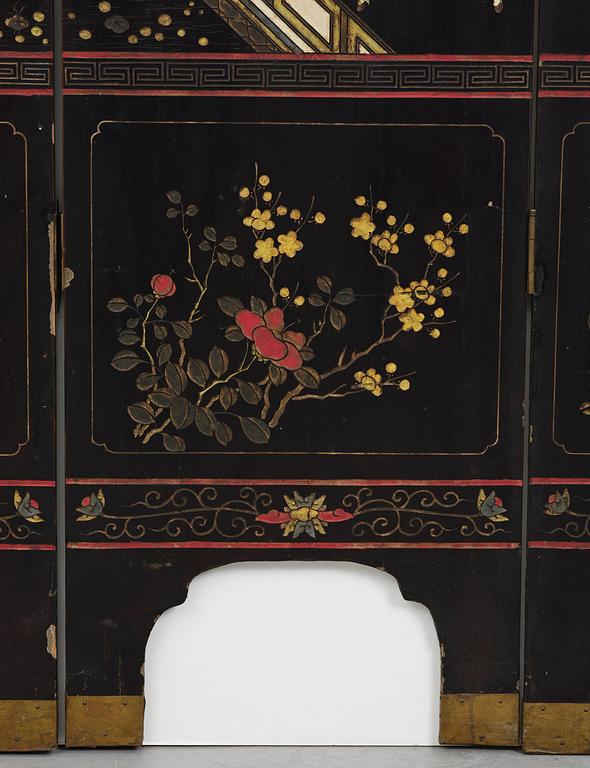 A Chinese four panel lacquer folding screen, first part of the 20th century.