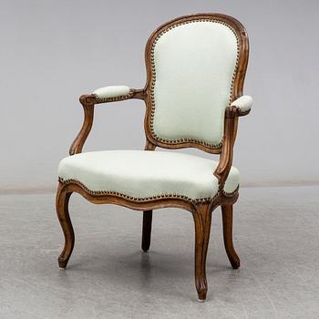 A French 18th century Louis XV armchair.