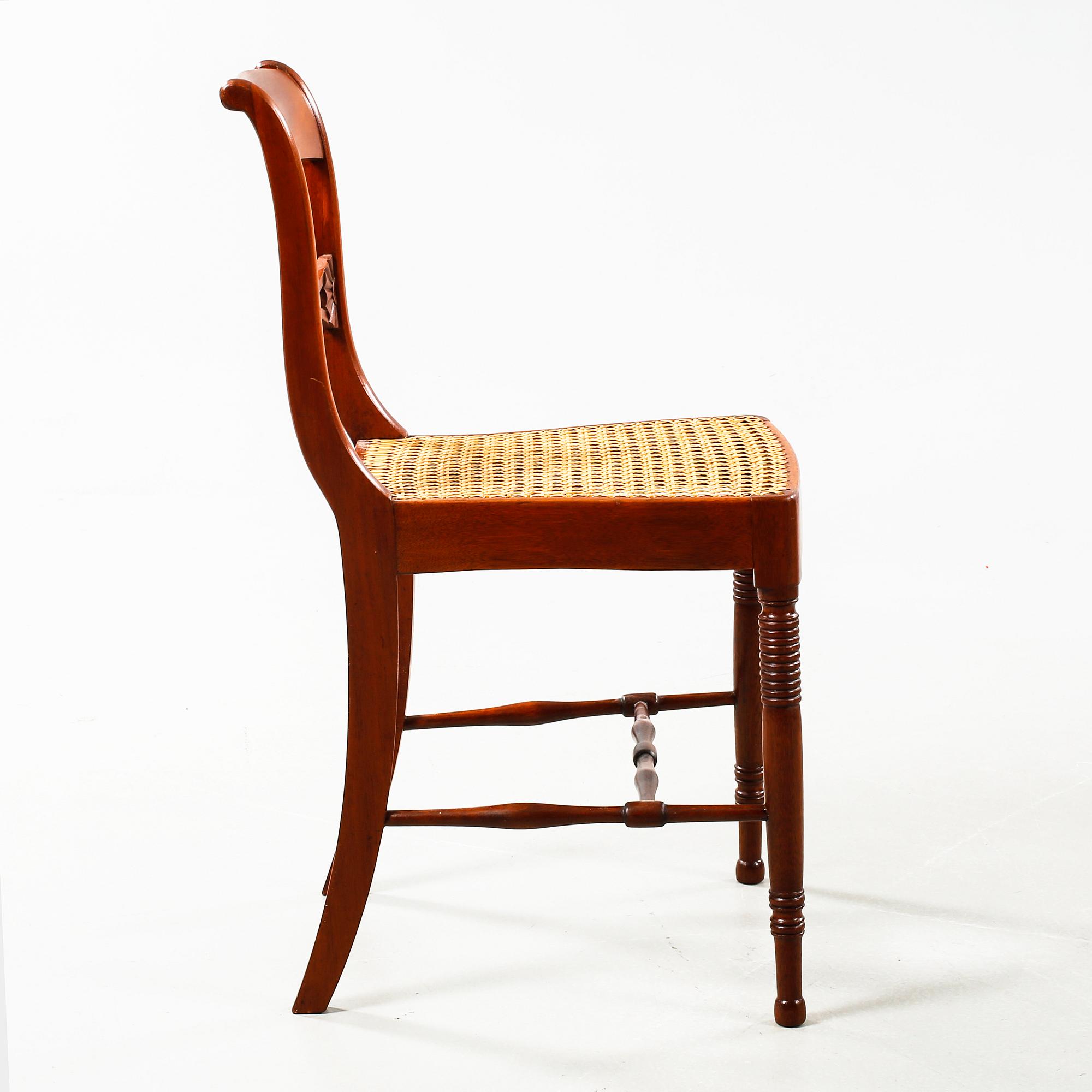 Nine chairs, made by Nils Tohrsson in Lindome (1779 - 1848) in the first half of the 19th century.