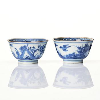 A matched set of eight blue and white cups and stands, Qing dynasty, Kangxi (1662-1722).